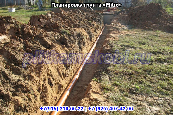 Планировка грунта на дачном участке в Московской области